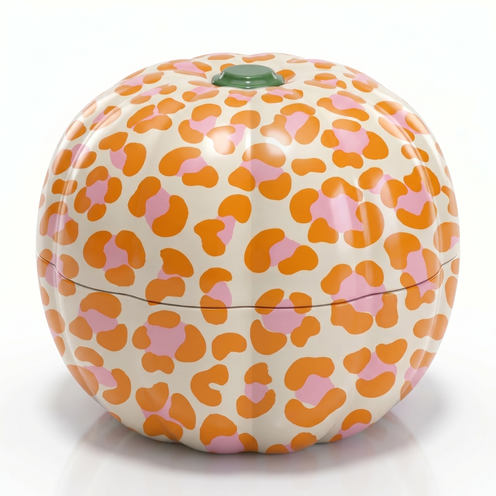 Väsen reusable pumpkin shaped tin in pastel orange, cream and pink leopard print, on a white background.  